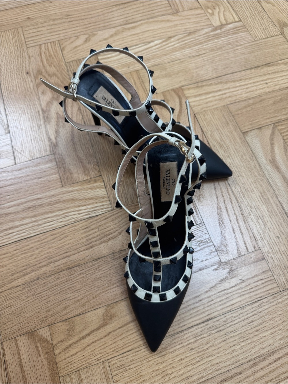Valentino Garavani Black and Ivory Rockstud Strappy Pointed Heels